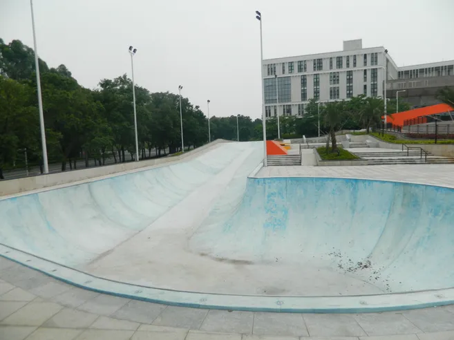 Concrete bank slalom and bowl area at Guangzhou University City Mega Skatepark