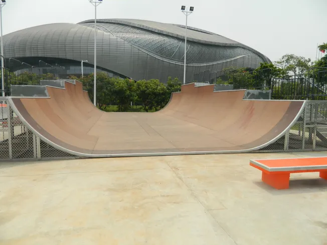 Large timber mini ramp in front of a stadium
