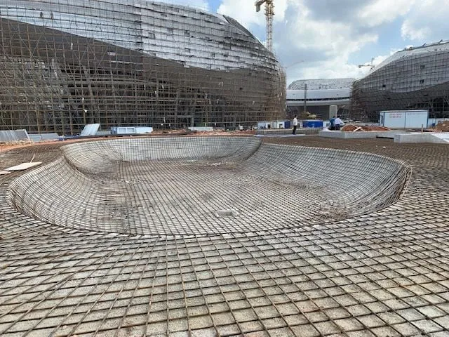 Steel reinforcement mesh formed into a skate bowl during construction