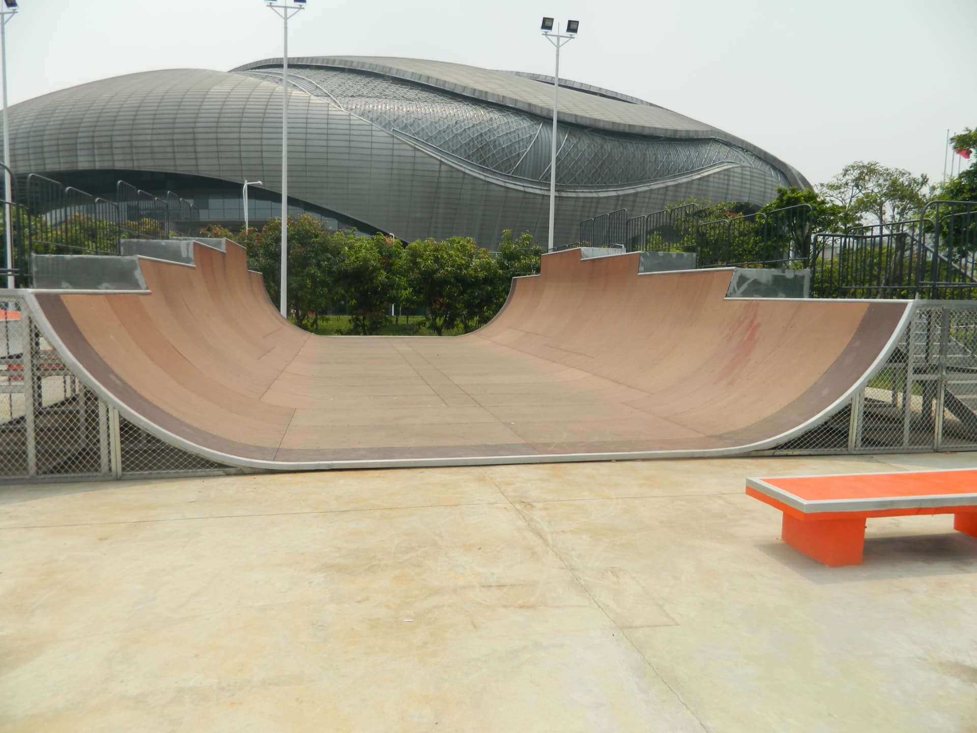 Large mini and vert ramp in Guangzhou with stadium in background