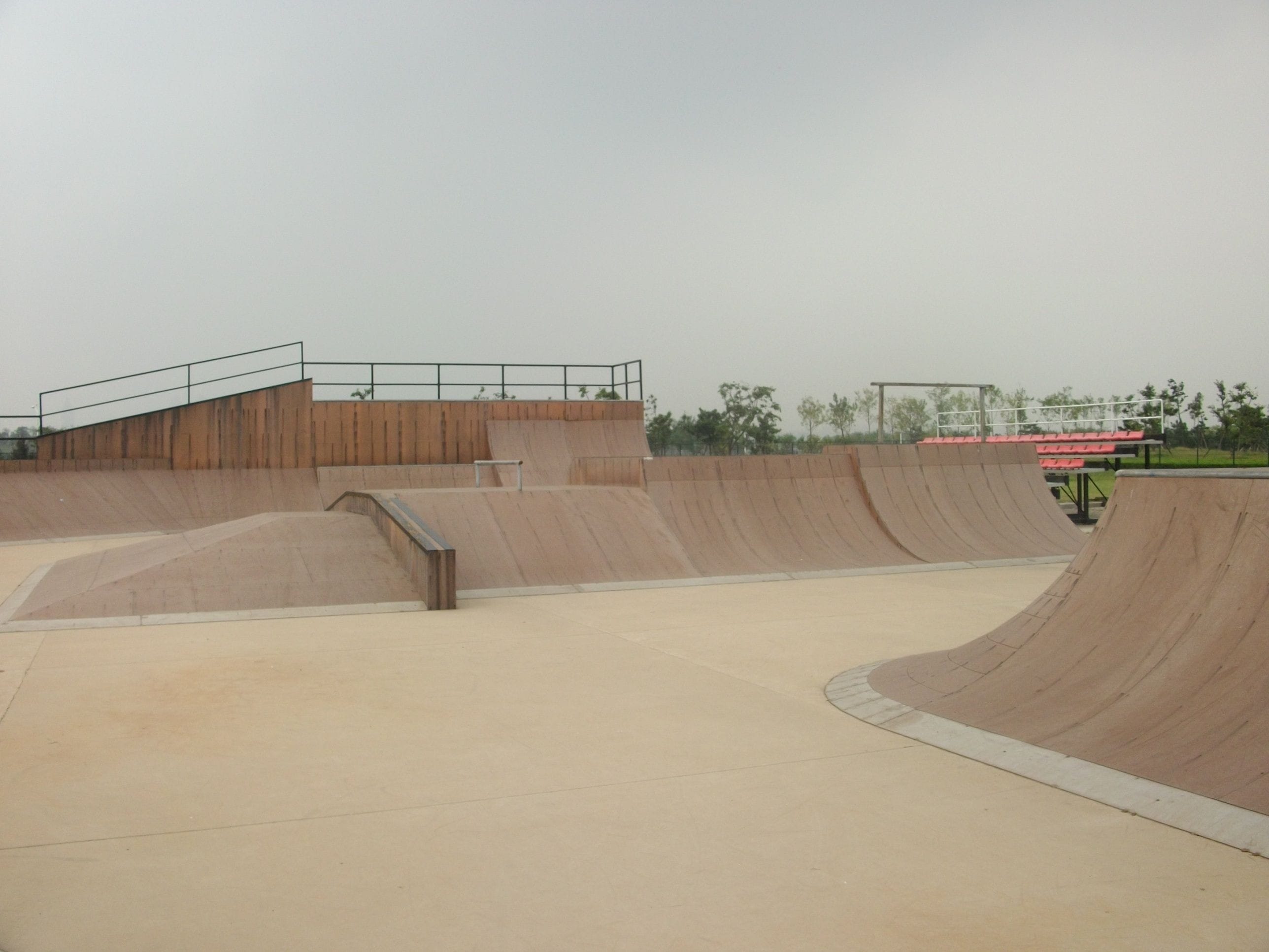 Concrete skatepark being inspected by Sk8scapes
